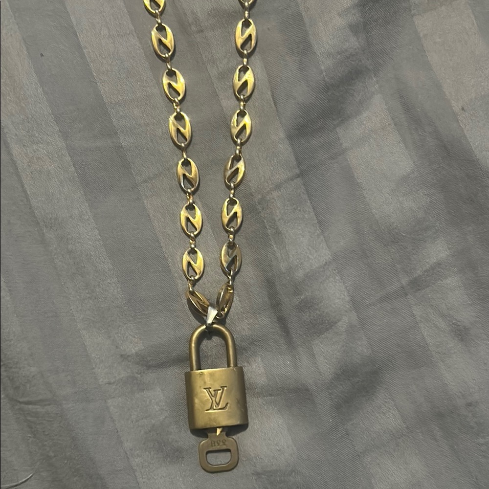 Authentic Louis Vuitton Golden Pad Lock Pendant